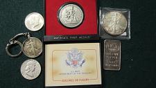 Buy Silver coins plus 1 oz silver bar and silver eagle here it also America's First Medal