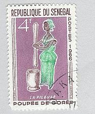 Buy Senegal 264 Woman Pounding Grain Used 1 (BP95415)