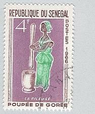 Buy Senegal 264 Woman Pounding Grain Used 1 (BP95409)