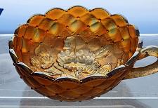 Buy Carnival handled Bowl embossed