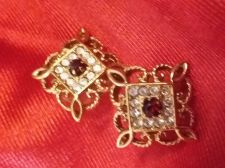 Buy Lady's Ear Rings -Red faceted stone surrounded by cubic zirconium & gold trim!!