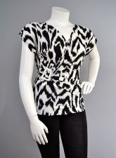 Buy Love Crazy Women’s Top Size 1XL-3XL Animal Print Buckle Surplice Cap Sleeves