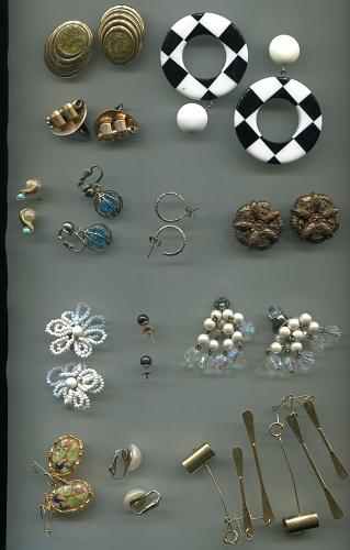 Here is an assortment of 12 pairs of errings made up of a variety of items. GROUP 3