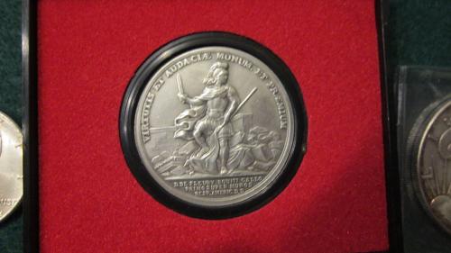 Silver coins plus 1 oz silver bar and silver eagle here it also America's First Medal