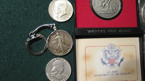 Silver coins plus 1 oz silver bar and silver eagle here it also America's First Medal