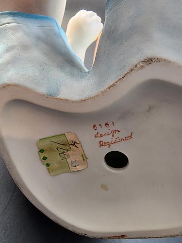 Hand painted bisque Porcelain piano doll