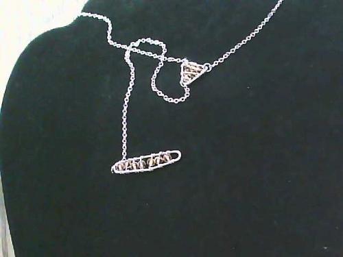 Gold Tone necklace with a triangular pendant and a rectangular pendant