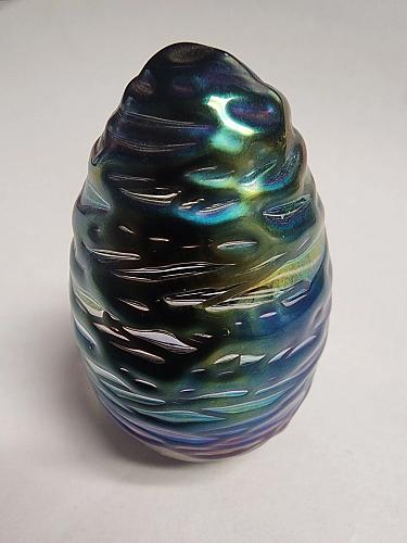 Glass eye iridescent treaded egg paperweight