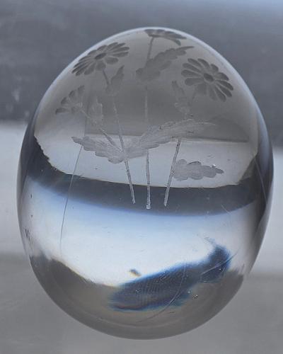 Glass egg paperweight with copper wheel engraved flowers