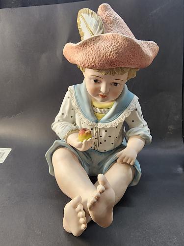 Hand painted bisque Porcelain piano doll